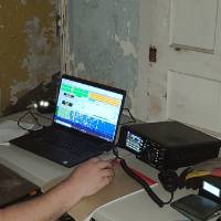 Student tests radio on computer (with flash)